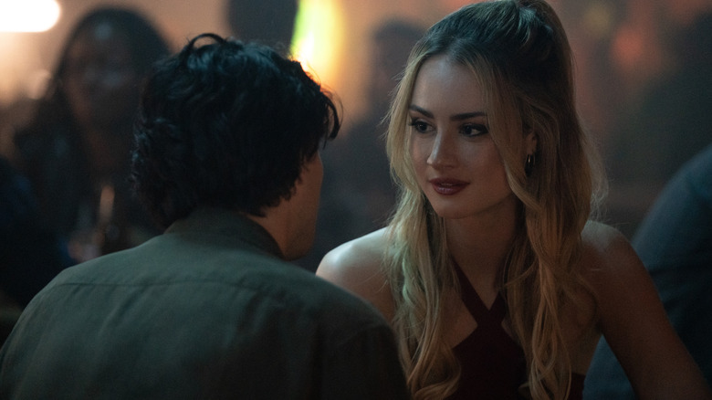 Lucy looking at Alex at a bar on Tell Me Lies