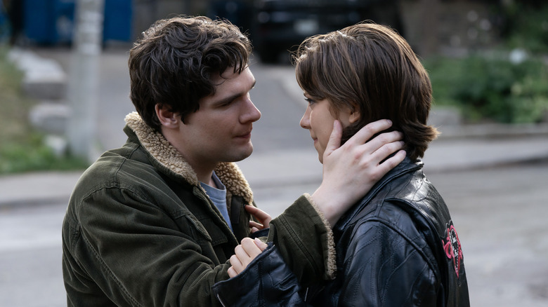 Bree and Wrigley about to kiss outside on Tell Me Lies