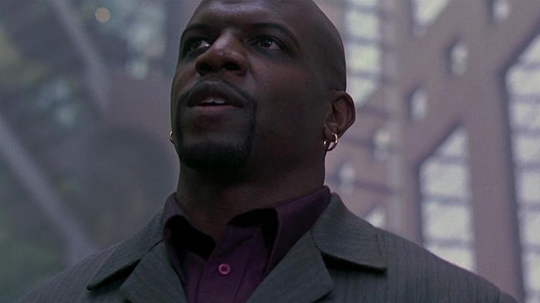 Terry Crews as Vincent looking upward in The 6th Day