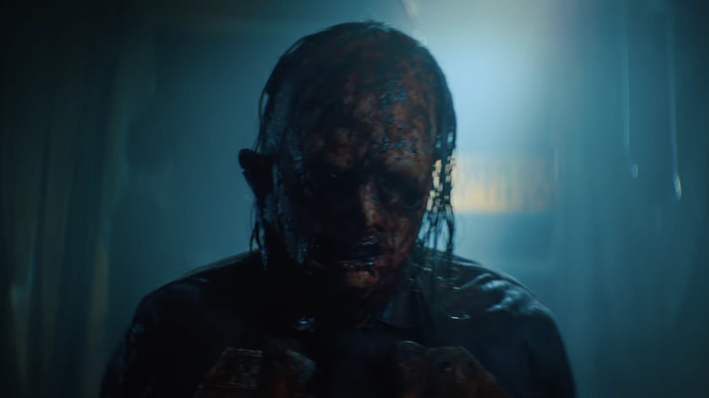a deformed and bloody man