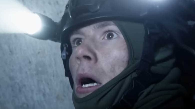 A soldier looking scared in 28 Years Later