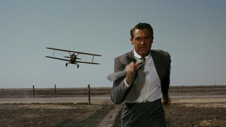 Roger Thornhill (Cary Grant) runs away from a plane in North By Northwest