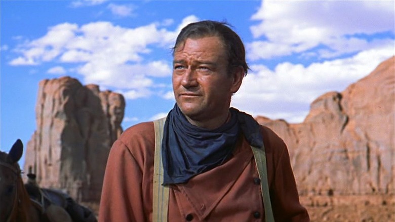 Ethan Edwards (John Wayne) in Monument Valley in The Searchers