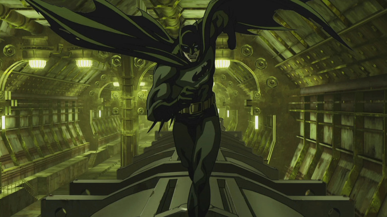 Batman running on the roof of a train car in the Batman: Gotham Knight segment Deadshot