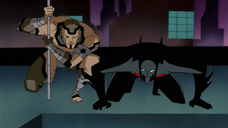 Batman Beyond Stalker kneels with Terry
