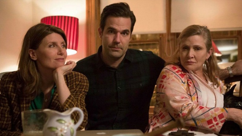 Sharon, Rob, and Mia sitting together