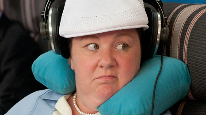 Melissa McCarthy riding on plane bridesmaids