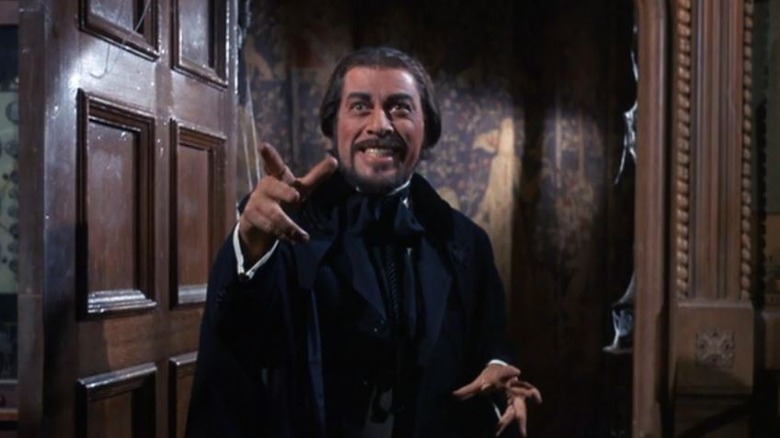 Vito Scotti as Dr. Boris Balinkoff grinning and gesturing on Gilligan's Island
