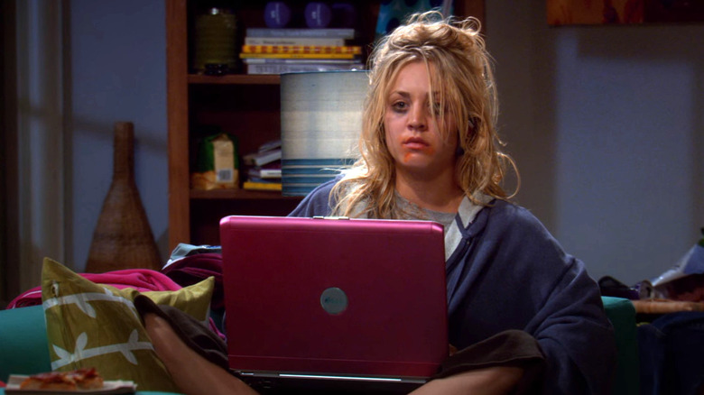 Penny looking like a mess in front of her computer on The Big Bang Theory