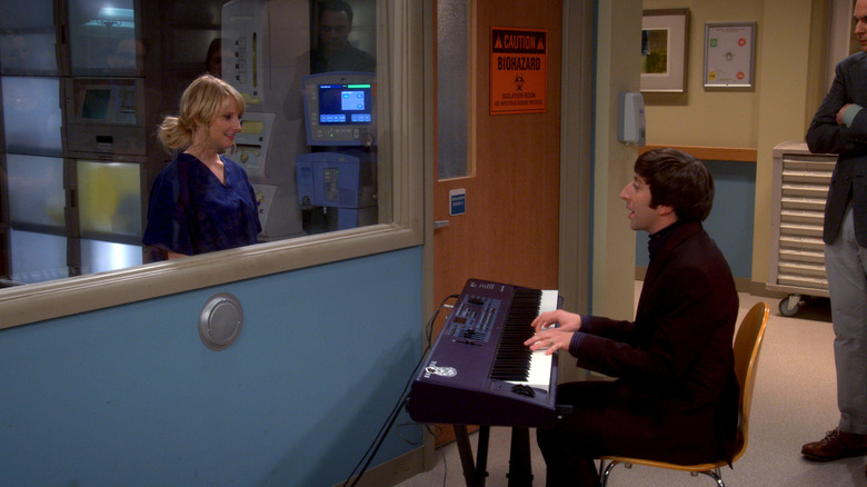Howard singing a song to Bernadette in her lab on The Big Bang Theory