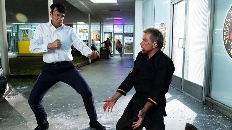 Ralph Macchio's Daniel LaRusso attacking Martin Kove's John Kreese on Cobra Kai