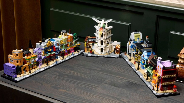 The LEGO Diagon Alley Wizard Shops displayed on a wood table