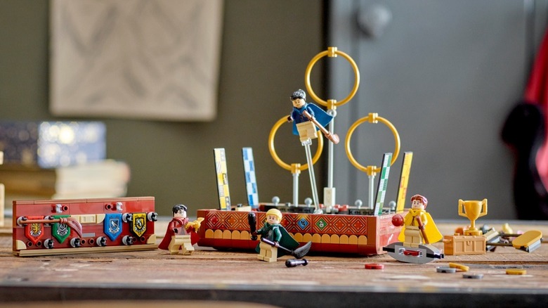 The LEGO Quidditch Trunk on a table with books