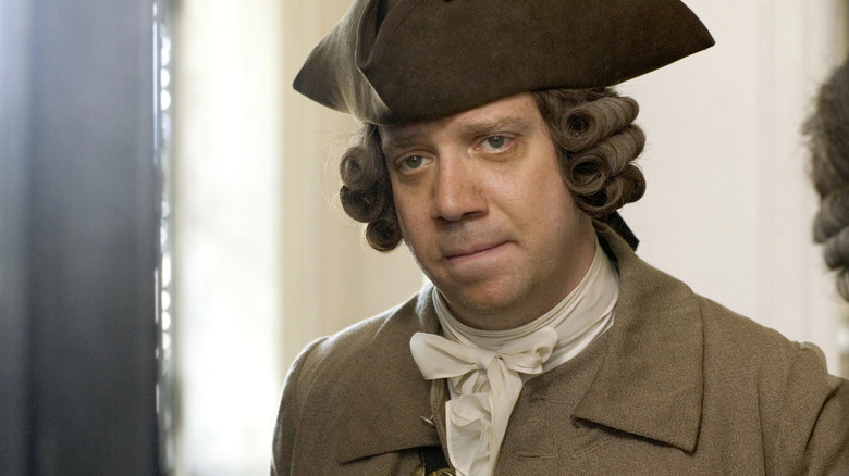 Paul Giamatti looks solemn as John Adams in John Adams