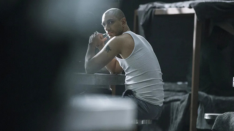 Riz Ahmed looks over his shoulder as Naz Khan in The Night Of