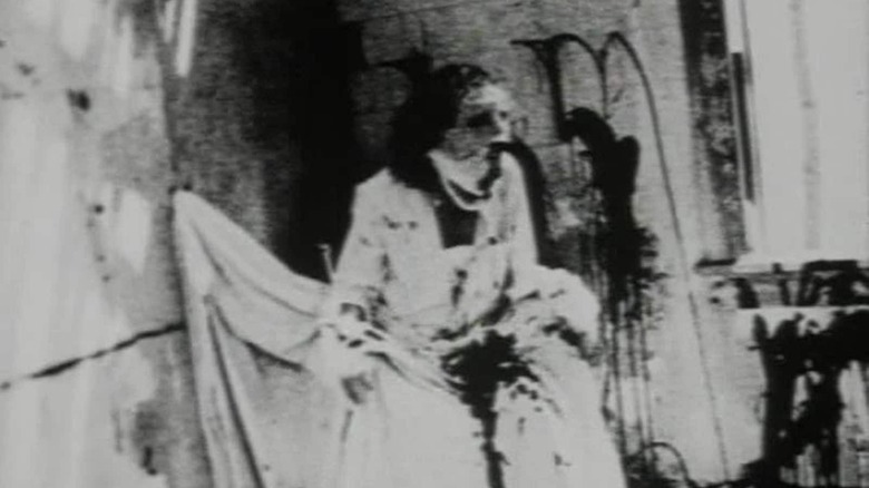 Brian Salzberg as God Killing Himself in Begotten