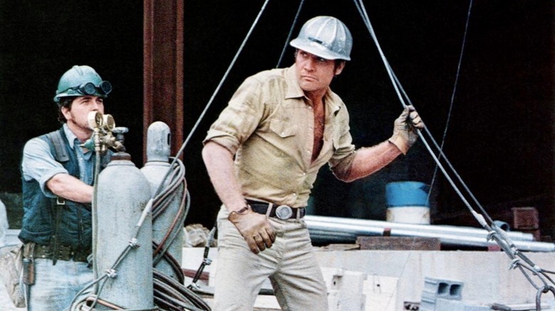 Lee Majors as Mike on a building site in Steel