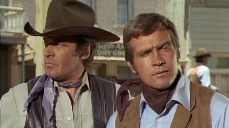 Peter Breck as Nick and Lee Majors as Heath, finding trouble in town in The Big Valley