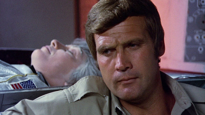 Lee Majors as Steve Austin in front of a frozen body in The Six Million Dollar Man