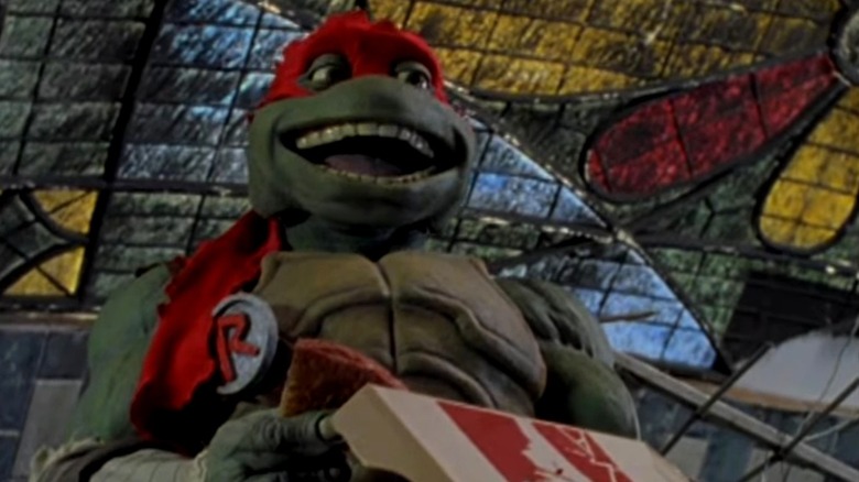 Raphael eating pizza in Ninja Turtles: The Next Mutation