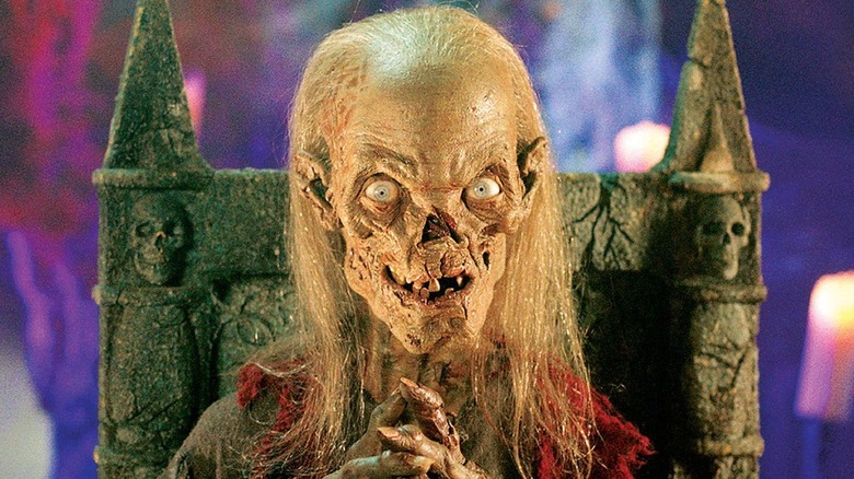The Cryptkeeper putting his hands together in Tales from the Crypt