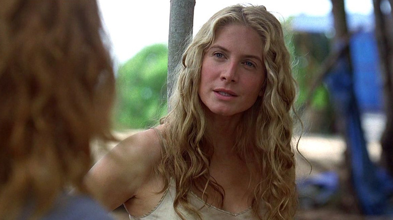 Juliet speaks to someone on the beach on Lost