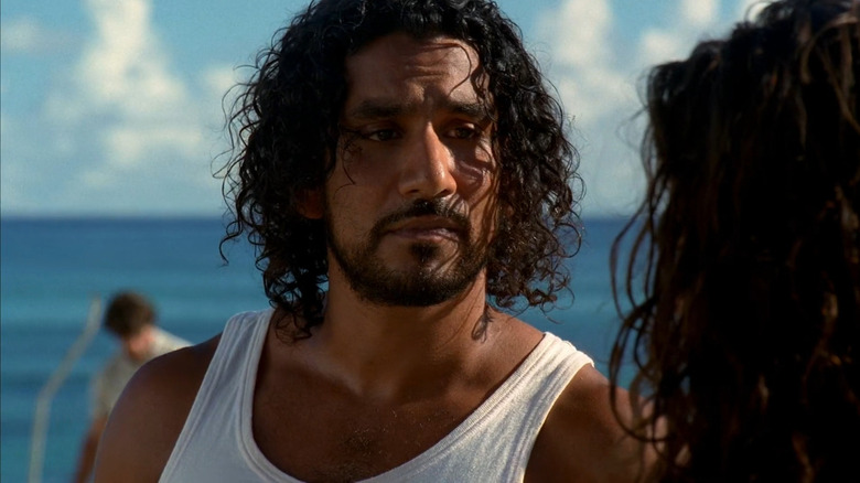 Sayid talks with Kate on the beach on Lost