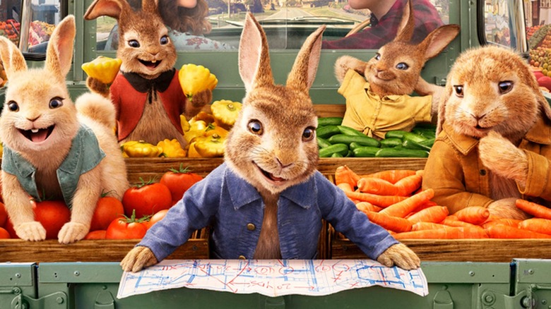 Peter Rabbit looks at blueprints