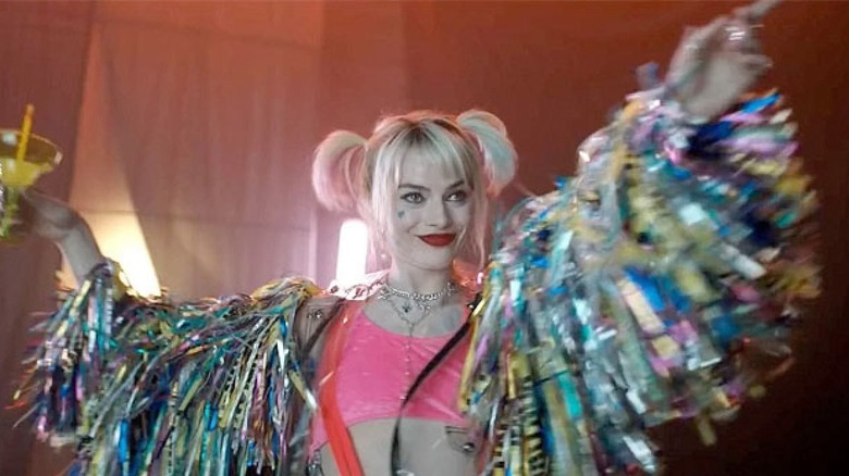 Harley Quinn (Margot Robbie) enjoys a drink