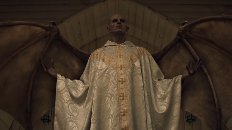 Vampire in priest robe