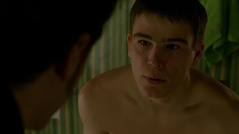 A shirtless Matt from "40 Days and 40 Nights" looks at his roommate, frustrated