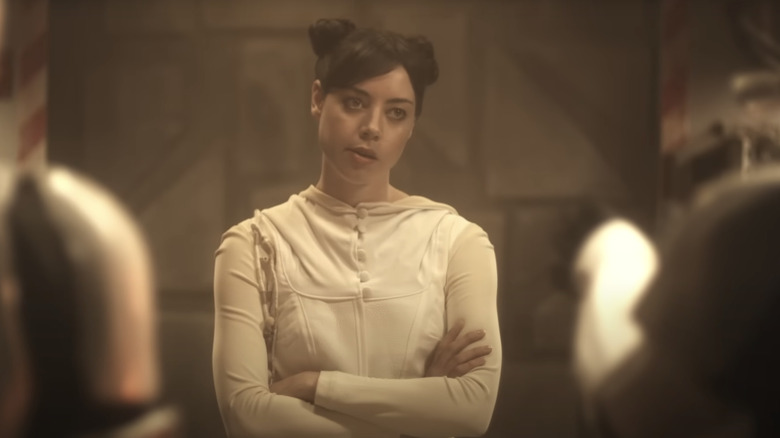 Aubrey Plaza as The Princess with her arms crossed in Troopers