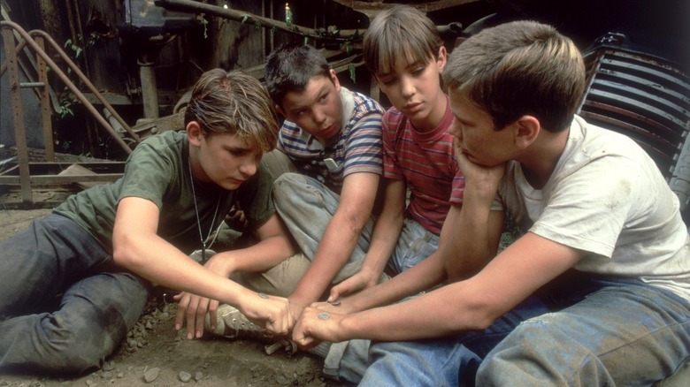 The four boys holding out their fists in Stand By Me