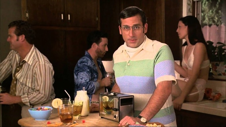 Brick Tamland smirking near bar