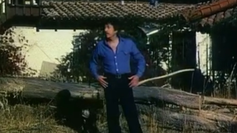 Man standing outside in Home Sweet Home