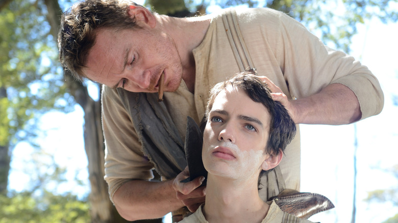 Michael Fassbender helps Kodi Smit-McPhee shave