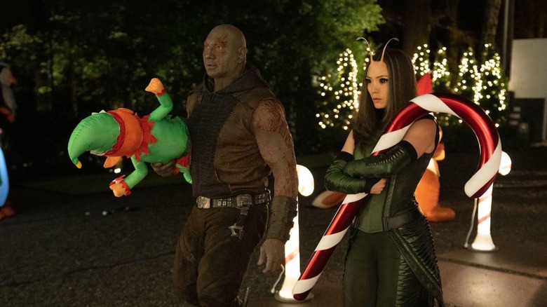 GOTG Holiday Special Drax and Mantis holding Xmas decorations