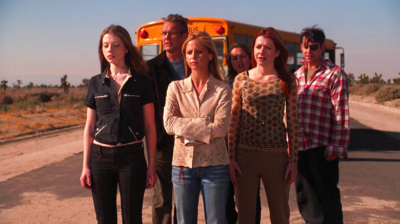 Buffy the Vampire Slayer's Dawn, Giles, Buffy, Faith, Willow, and Xander looking sad