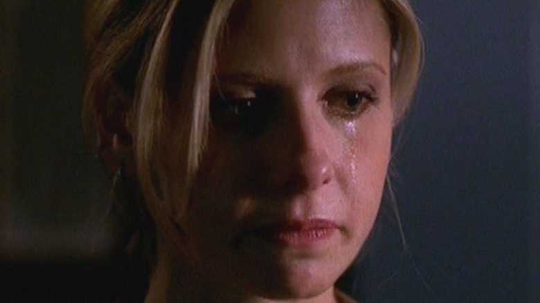 Buffy holding back tears
