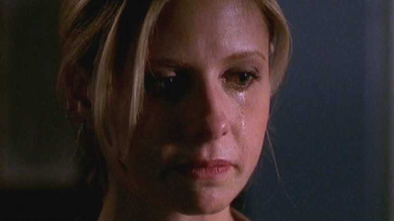 Buffy holding back tears