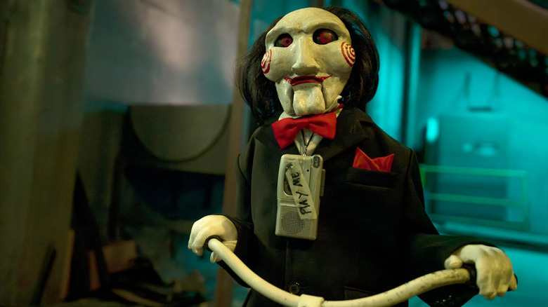 Billy the puppet, serving as the mouthpiece for Jigsaw