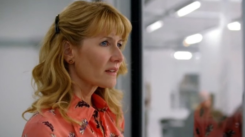 Laura Dern as Amy Jellicoe standing in a gray office on Enlightened