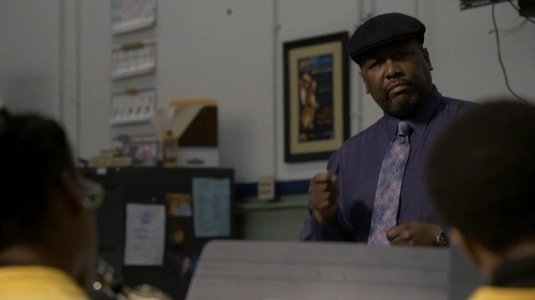 Wendell Pierce as Antoine Batiste supervising a school band practice on Treme