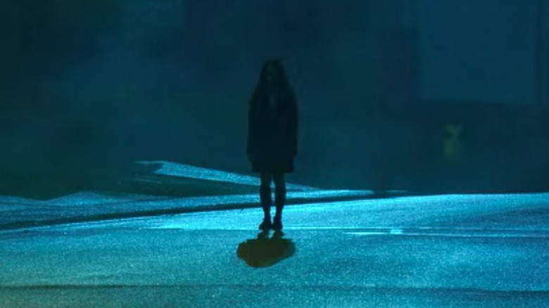 Aya Furukawa standing in The Midnight Club