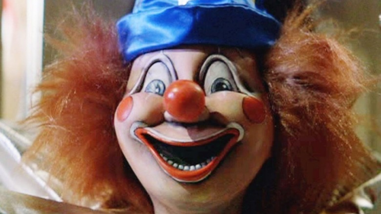 Poltergeist clown smiling