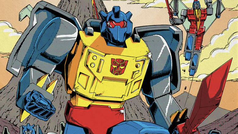 Transformers '84 cover: Grimlock holding sword, with volcano and Swoop in background