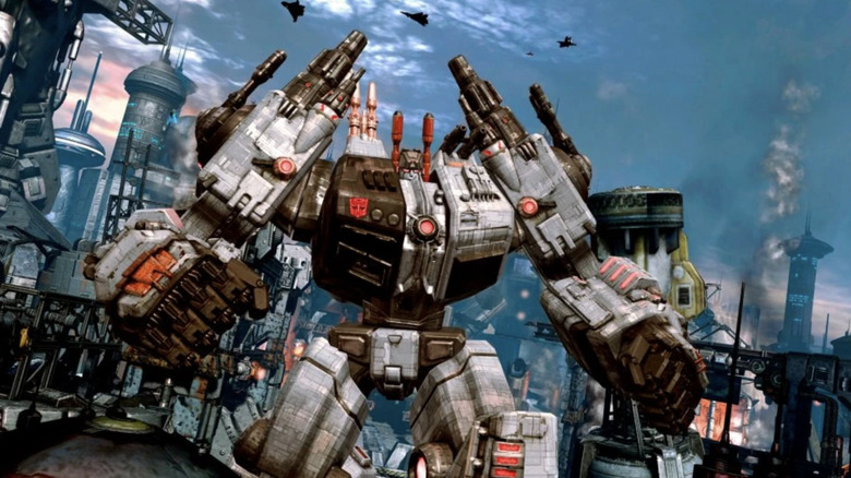 Transformers: Fall of Cybertron - Metroplex standing in Autobot City