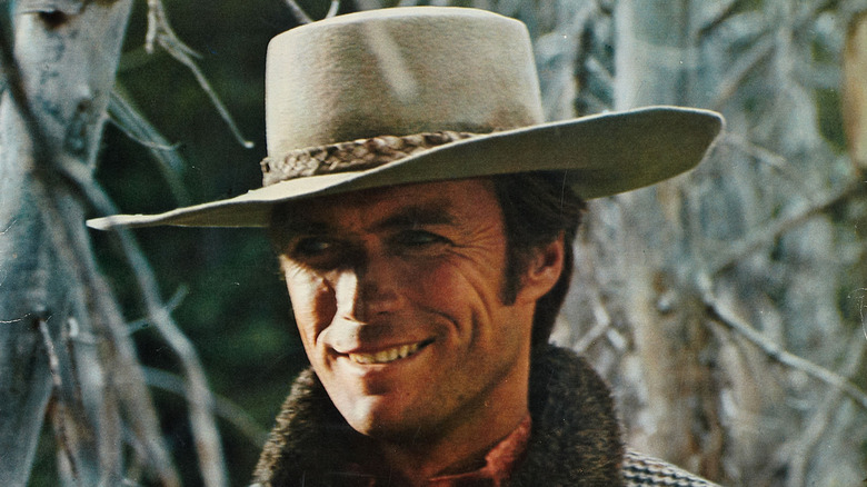Pardner (Clint Eastwood) smiles in the woods in Paint Your Wagon