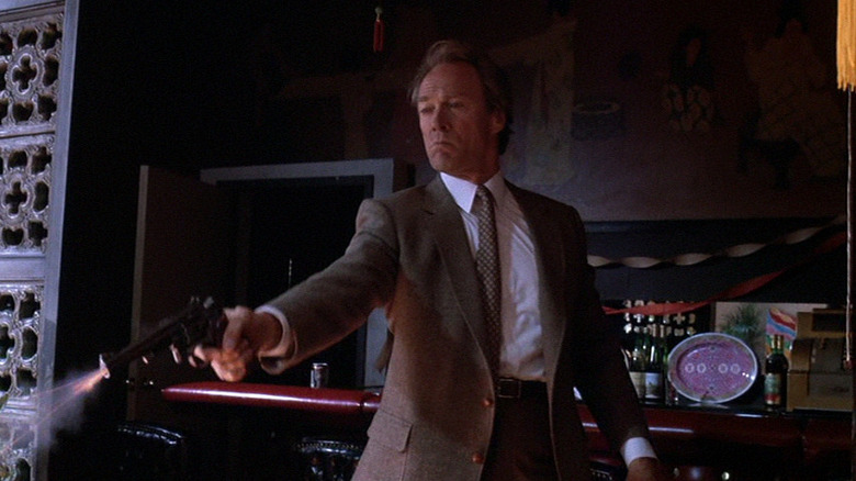Harry Callahan (Clint Eastwood) fires his magnum in The Dead Pool