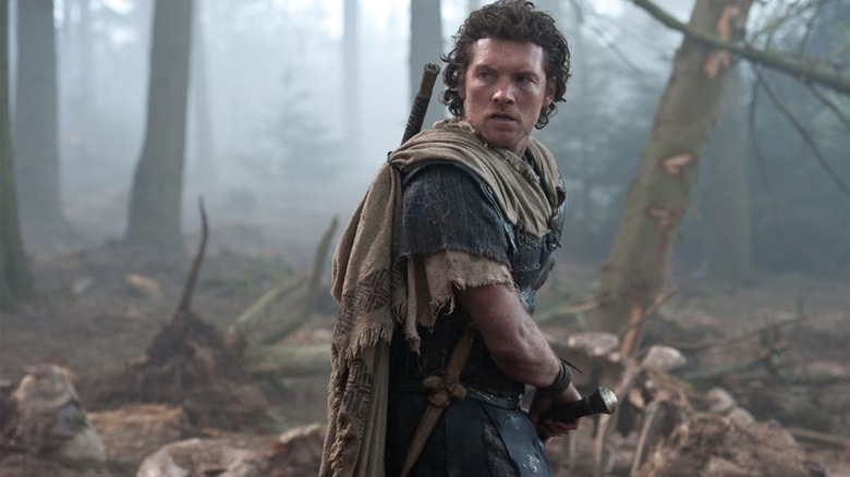 Now sporting Grecian curls, Sam Worthington's Perseus is rugged and dirty amongst bones.